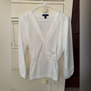 Women’s white long sleeve blouse. Perfect condition.